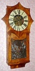 C.1850, German, I. B. Saier, Saig [Baden-Wurtemburg], an interesting 2-weight wall clock, showing a lot of American influence, the 8-sided star shaped top similar to what Silas B Terry designed for his iron case, this one of mahogany veneer over pine.