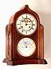 C.1890, French, Brocot and Delettrez, for the English Market, double dial perpetual calendar in an oak and veneer case of Gothic style, with open escapement on the porcelain dial.