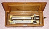 C.1895, Swiss, Mermod Freres, 12-Tune Music box in an oak case, 13" cylinder, and with Jacot's Safety Check, Fast/Slow lever, and Mermod tune indicator with repeat and change switch, key wound from right side. Tunes include turn of century favorites: Washington Post March, Now that the Day is Over, and Bicycle Built for Two.