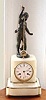 C.1880, French, Farret a' Paris, Bronze and white marble MYSTERY clock, the movement with a steel arm over the verge, near the top case panel, which is moved from side to side by a strong magnet in the bottom of the pendulum, which attraction for the steel pulls the pendulum toward the center and results in a 'scape at the same time. A small brass counter weight brings the verge back to center and gets it ready for the next impulse from the other direction. The bronze figure signed Ferrand.
