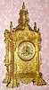 C.1890, French, Large Gilt Brass Architectural clock, the substantial case with buttresses and fancy finials, now with another movement from the same period, with fancy cast dial and individual cartouche numerals.