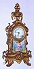 C.1900, Ansonia Clock Co., ROYAL, gilt white metal mantel clock, with porcelain plaque in the base of a gentleman playing the mandolin to a lady.