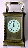 C.1900, French, Brass Cased Carriage Clock in a stylized Anglaise case with turned quarter columns at each corner, and rippled molding top and bottom, time, strike and repeat, 8-day.