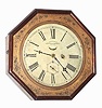 C.1865, Waterbury Clock Co., Octagon Lever, 8-day timepiece with Patent Jeweled Escapement, in a rosewood veneered case with an embossed brass dial surround. 8 bezel segments are solid rosewood.