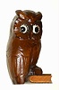 C.1960, German, Oswald, Rotating Eye clock in the form of an owl setting on a book, molded composition case.