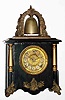 C.1904, William L. Gilbert Clock Co., "Melody", 8-day time/strike mantel clock. Most collectors call this a Curfew model, but other designs of the basic case were offered and given a different name. This is one of them.