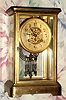 C.1900, French, Japy Freres, 4-Glass CRYSTAL REGULATOR, 8-Day time and gong strike with gilt brass case and porcelain dial with fancy floral center, retailed by Henry Birks and Sons, Ltd..