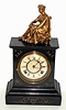 C.1900, Ansonia, Enameled Iron mantel clock with gold painted decorative figure.