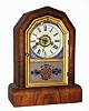 C.1870, Gilbert Mfg, COMET, oct top, time, strike and alarm cottage clock in rosewood, 30-hour.