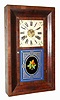 C.1870, Jerome and Co., New Haven, "OG", mahogany veneer, with floral tablet.