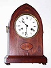 C.1910, German, Philip Haas, Mahogany Lancet top mantel clock with inlay below the dial, 8-day gong strike mov't.