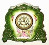 C.1900, Ansonia Royal Bonn, La Marne, porcelain china clock, forest green with multi color floral accents, and with open escapement dial.