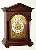 C.1915, German, Junghans, Westminster chime bracket clock, mahogany case, peaked top, with chime-silent and F/S dials in the arch.