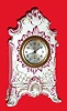 Mixed lot: C.1900 Ansonia 30-hour movement in a nice German miniature porcelain case,
