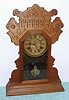 C. 1885 Waterbury Clock Co., "Jarvis", 8-day time/strike walnut mantel clock.