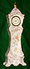 C. 1890 New Haven Clock Co.?, 30-hour miniature porcelain tall clock. This case may have a replaced movement as an example of this case appears in an Ansonia catalog with the number 2516.