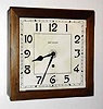 C.1929, New Haven Clock Co., BALCONY, 12" model wall clock, in a stained poplar case, 8-day time only.