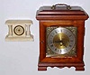 Lot of 2: C.1980, German, Westminster chime mantel clock and C.1910 small white marble 30-hour lever movement mantel that could be a New Haven.