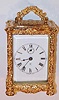 C.1905, Waterbury Clock Co., cast white metal carriage clock, gold plated, with porcelain dial.
