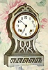 C.1911, Ansonia Clock Co., NY, "THEBES", cast iron mantel clock, with Art Nouveau designs cast into the metal, finished in Pewter.