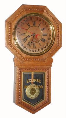 E. Ingraham and Co., "ECLIPSE CALENDAR" , pressed oak, long drop octagon timepiece with simple calendar. C.1910. — Antique Clocks Price Guide