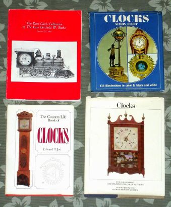 Books, box lot: "A Treasury of American Clocks" by Brooks Palmer; "The Book of American Clocks", by Brooks Palmer; "Clock Construction, Maintenance and Repair", by Coggins; "The Noble Jerome Patent 30 hr Brass Weight Movement", Nawcc; "The Romance of Time" by Brooks Palmer, "Clocks" (Smithsonian Illustrated Library), Cooper-Hewitt Museum; "CLOCKS", by Simon Fleet; "Q and A of the Clockmaking Profession", Baier, Tigner, Whitney, 1981; "The Country Life Book of Clocks", by E. Joy; "Simon Willard and His Clocks", by John Ware Willard; "Alte Uhren", German magazine, Jan 1978; Catalog: Bournes, Bothe Clock Collection, 1987; "The Lure of the Clock", Hering; "Horolovar 400 Day Suspension Guide" (Dec 2003), "The Old Clock Book" by Moore; "Clocks and Their Value", by deCarle; "Complicated Watches and their Repair", deCarle; "Dictionary of Clocks and Watches" by Bruton: "Clocks, Repair and Maintenance" by E. Smith; "Thomas Tompion" by R. W. Symonds; and "Horology Americana by Dworetsky and Dickstein. — Antique Clocks Price Guide