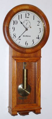 Seth Thomas Clock Co., REGULATOR No. 2, weight driven wall timepiece in an oak case. C. 1900. — Antique Clocks Price Guide
