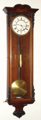 Austrian, late Biedermeier timepiece, 30-day 1-weight, maintaining power, in a rosewood case with dark gesso accents, less top trim. C. 1855. — Antique Clocks Price Guide