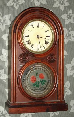 E. Ingraham and Co., Bristol, Conn, "VENETIAN", rosewood round Gothic shelf clock, 8-day time and strike, spring. C.1863. — Antique Clocks Price Guide
