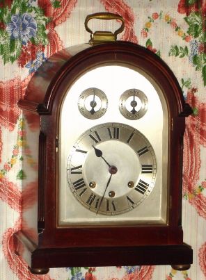 German, Westminster Chime bracket clock, in a mahogany case with canted, reeded corners, and with silvered arched dial with subsidiary dials for F/S and Chime/Silent, 8-day. C.1920. — Antique Clocks Price Guide