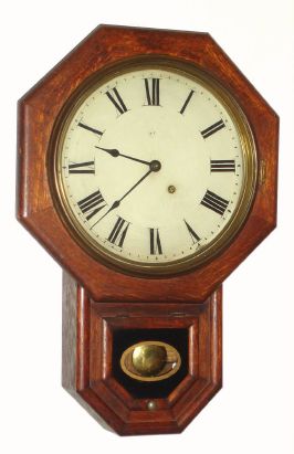 Seth Thomas Clock Co., DROP OCTAGON 12 INCH, short drop octagon timepiece in oak, 8-day. C.1910. — Antique Clocks Price Guide