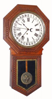 E. Ingraham and Co., "HARTFORD", oak cased, long drop octagon calendar timepiece, 8-day, spring. C.1907. — Antique Clocks Price Guide