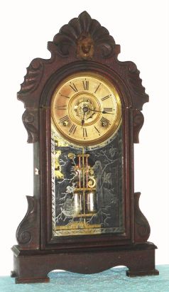 Ansonia Clock Co., "EQUAL", walnut parlor clock, 8-day, time and bell strike 8-day with bell alarm. C.1883. — Antique Clocks Price Guide
