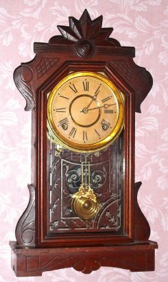 E. Ingraham and Co., PHENIX, walnut cased shelf clock, 8-day time and gong strike, spring. C.1881. — Antique Clocks Price Guide