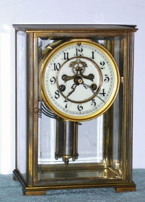 Waterbury Clock Co., MANCHE, 4-Glass, crystal regulator, 8-day striking, and with uncommon Waterbury single jar faux compensating pendulum. We have had several with the pendulum over the years. C.1910. — Antique Clocks Price Guide