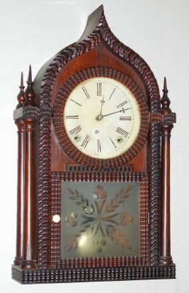 Forestville Mfg Co., (J. C. BROWN), Forestville, Conn, Ripple Front, rounded gothic, 4 post / onion top, with frosted/cut tablet, 8-day spring. C.1850. — Antique Clocks Price Guide