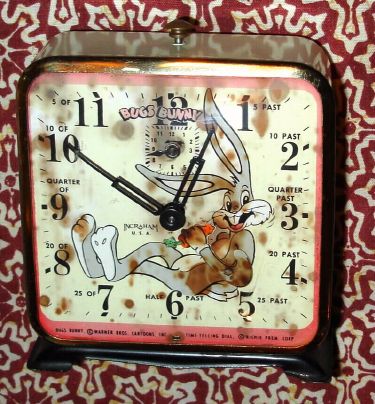 E. Ingraham and Co., Bristol, Conn, BUGS BUNNY animated alarm clock, Bug's eating a carrot while the clock ticks. C.1950. — Antique Clocks Price Guide
