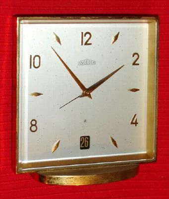Swiss, ANGELUS, 8-day, 15-jewel alarm clock with calendar aperture at 6. C.1960. — Antique Clocks Price Guide