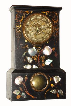 Terry and Andrews (Ansonia Clock Co.), iron cased shelf clock with MOP decorations, 8-day time and strike. Anson Phelps persuaded Terry and Andrews to move to Ansonia to produce clocks in 1850. The factory was destroyed in 1854. Clocks produced in that short time have Terry and Andrews movements and dials that say Ansonia Clock Co. The later Ansonia Clock Co was not formed until 1877. C.1852. — Antique Clocks Price Guide