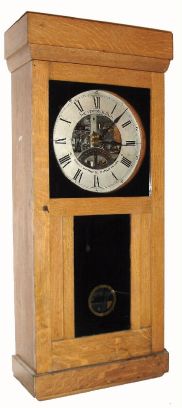 Gisholt Machine Co., Madison, WI, PERIODOGRAPH, a weight driven programmable contact maker, with an E. Howard No. 70 movement and pendulum to power the program discs, in an oak case with black/gold tablet in the front door. C.1919. — Antique Clocks Price Guide