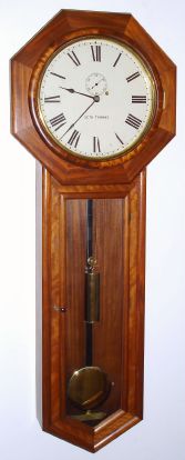 Seth Thomas, REGULATOR No. 18, long drop octagon with meter pendulum, weight driven, 8-day, mahogany case. C.1890. — Antique Clocks Price Guide