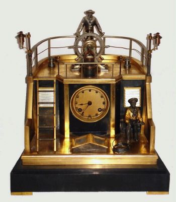 French, Guilmet, "QUARTER DECK" clock, with rocking seaman at the helm, 8-day time and gong strike, and with unique "rope chapter" ring. C.188. — Antique Clocks Price Guide