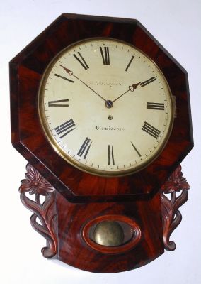 English, Single Fusee, Octagon drop wall clock in mahogany, 8-day, with carved accents; rt hand access door for pendulum. C.1870. — Antique Clocks Price Guide