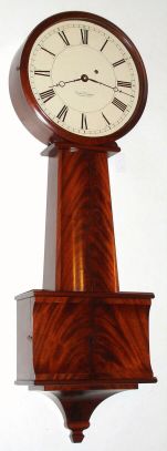 Foster S. Campos, tavern wall clock, a limited reproduction (ten only) of a rare Dunning clock owned by Herb Nillson, and that was sold at Skinners lot No. 37, June 7, 2009, for $29,625. Foster borrowed Nillson's very clock for 3 months to make the plans for this model, C.1983 (dated on case), serial No. 5. — Antique Clocks Price Guide