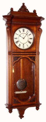 Seth Thomas "MARCY" in walnut, striking the quarter hours on 2 cupped bells and the hours on a cathedral gong, with nickeled bezel and damascene pendulum. C.1890. — Antique Clocks Price Guide