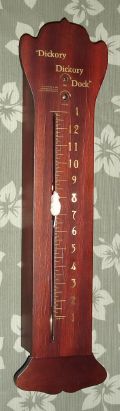 Horolovar Reproduction of the famous DICKORY DICKORY DOCK clock, a rising mouse indicates the time at his nose, 8-day lever movement. Mouse falls suddenly at 1 o'clock and rings a bell. C.1975. — Antique Clocks Price Guide