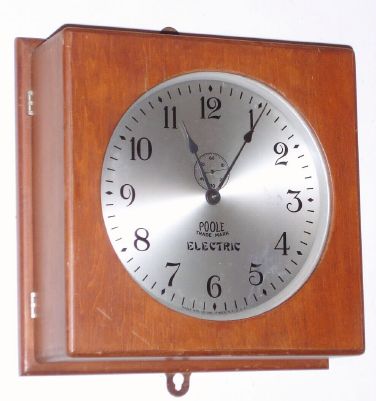 Poole Manufacturing Co, Ithaca, NY, "RELIANCE" electric battery wall timepiece. C.1928 — Antique Clocks Price Guide