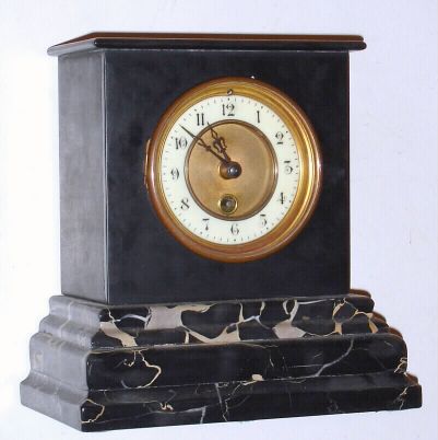 French, 8-day marble mantel timepiece, with porcelain chapter ring and pendulum movement, spring. C1900. — Antique Clocks Price Guide