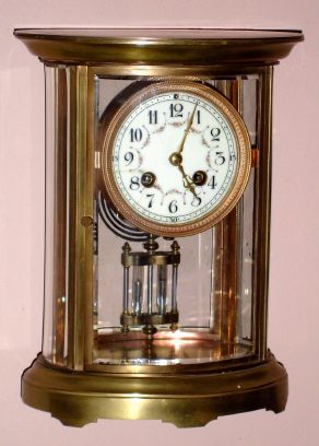 French, OVAL 4-glass crystal regulator with fancy porcelain dial and 2-vial compensating pendulum, time and gong strike, spring. C.1905. — Antique Clocks Price Guide