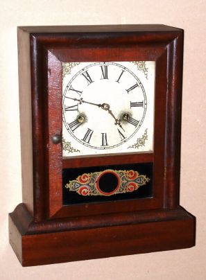 Wm. L. Gilbert Clock Co., "Coupon", 30-hour time/strike cottage clock. Circa 1879. — Antique Clocks Price Guide